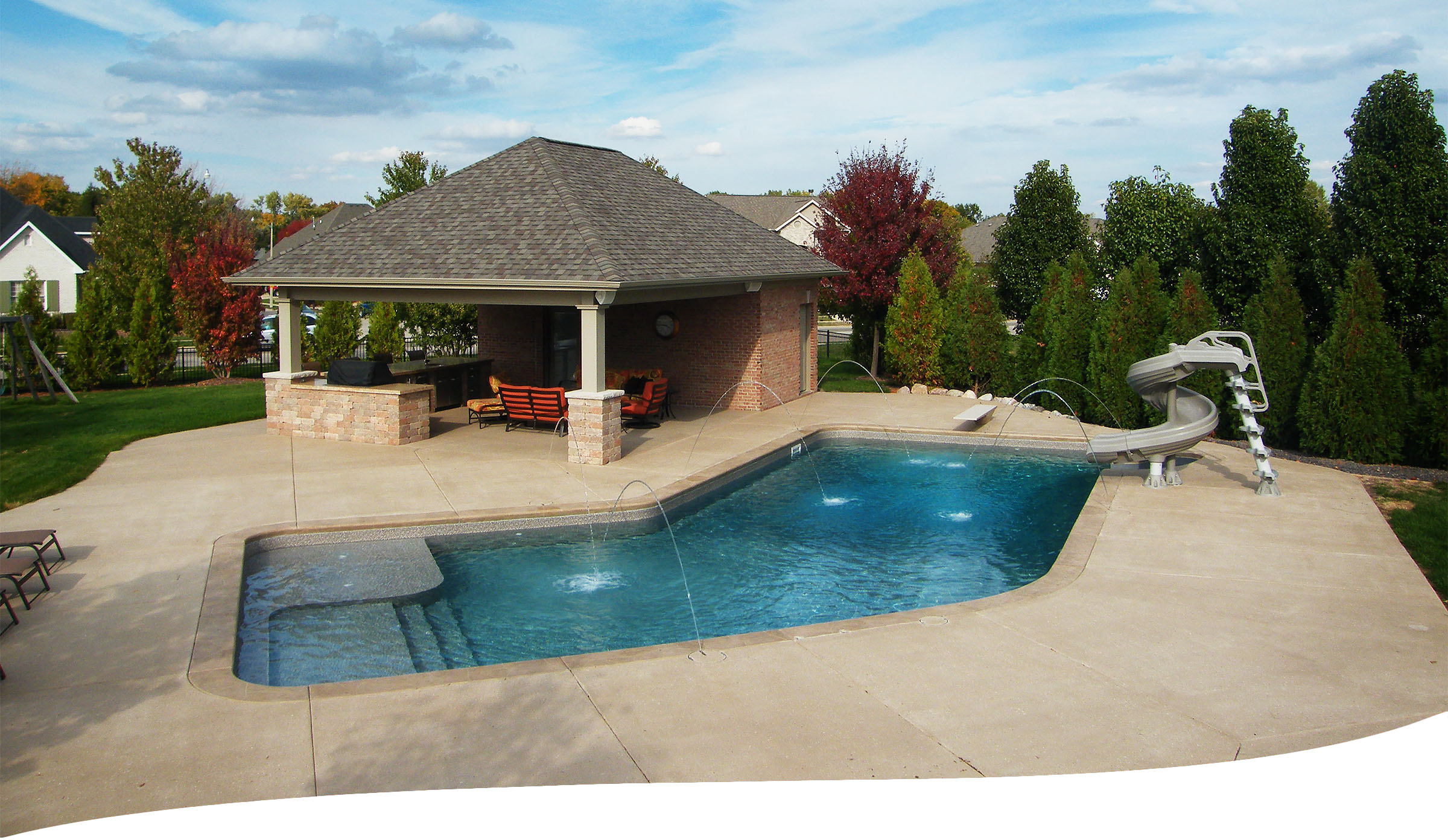 beautiful custom hardscaping, landscaping and pool